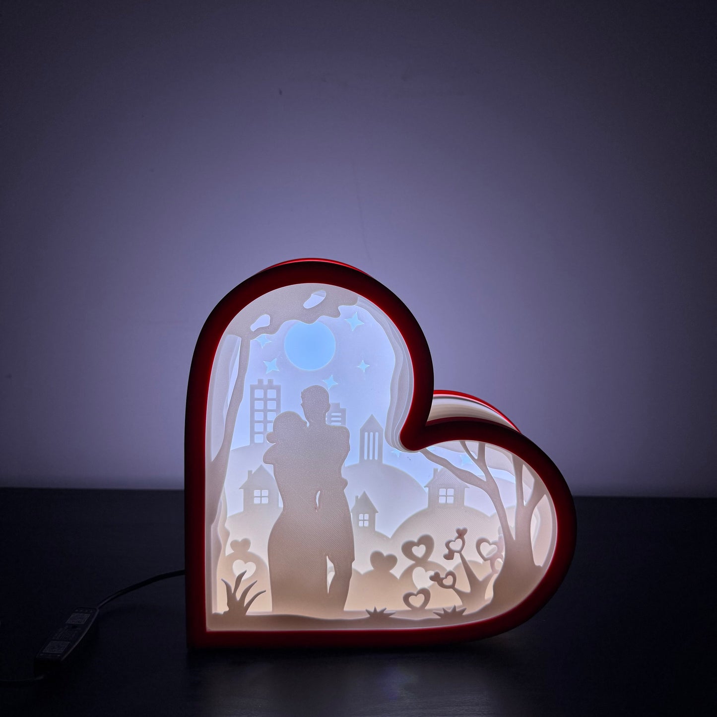 Personalized photo lamp with warm LED light featuring a custom love silhouette design