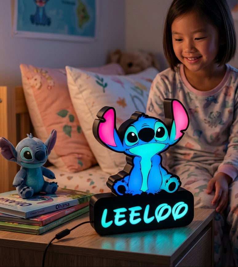 Child sitting on a bed with a glowing Stitch lamp and plush toys in a bedroom setting.